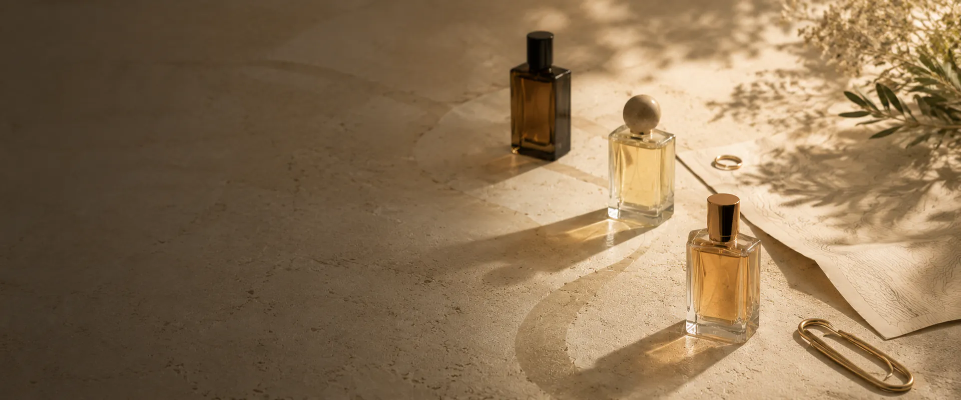 Three fragrance bottles arranged as choices for finding your scent